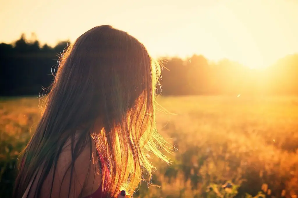 A Little Girl With Straight Hair During SUnlight