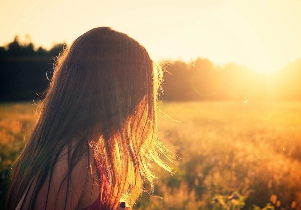 A Little Girl With Straight Hair During SUnlight